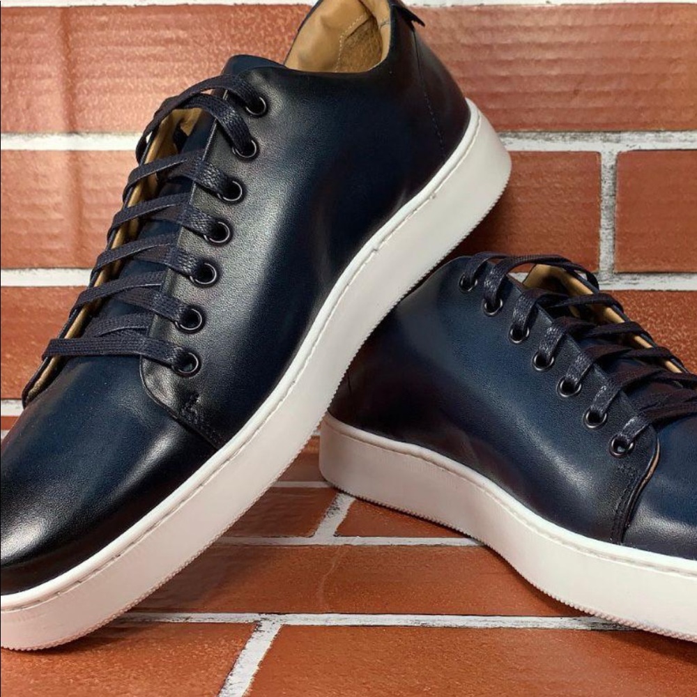 Blue all leather burnish sneaker. Made in Italy